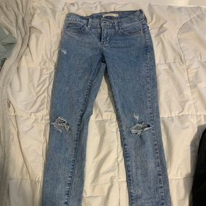 light washed slightly ripped skinny jeans